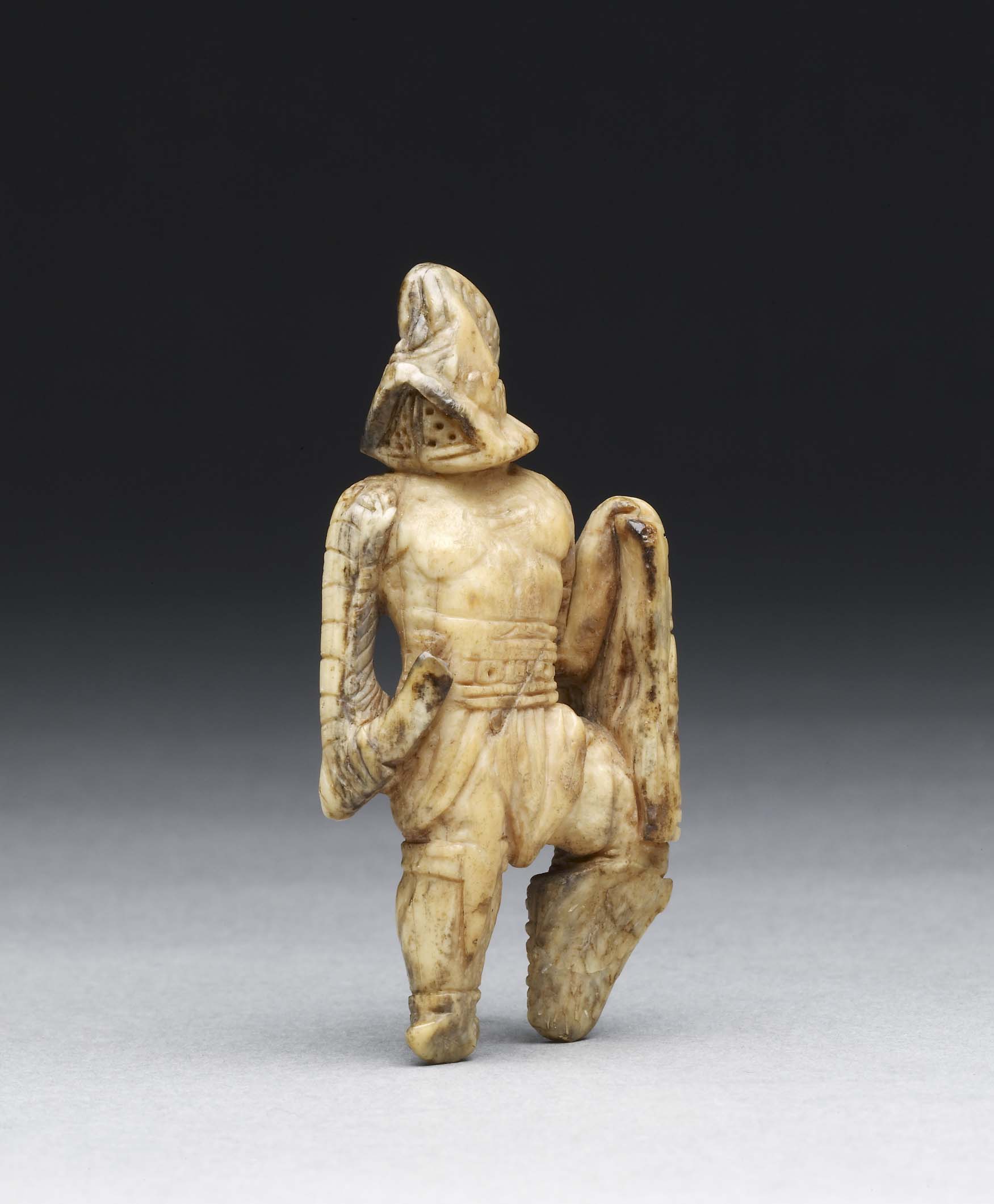 Bone gladiator figurine © 2024 The Trustees of the British Museum